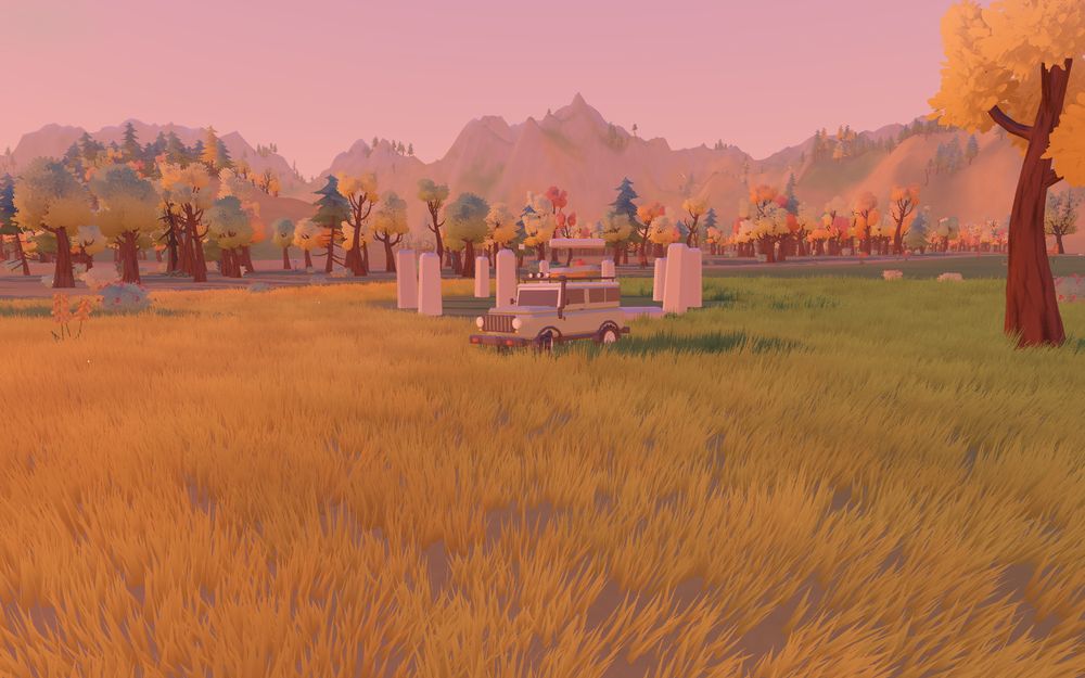 Standing stones in an autumn meadow at sunset, the truck parked beside them.